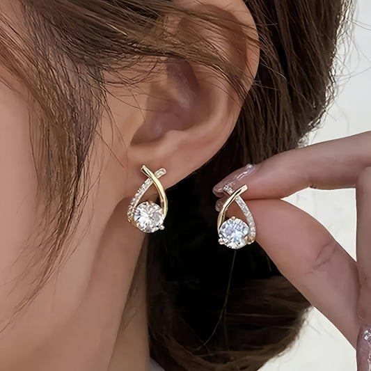 Boucles d'Oreilles avec Croix Dorée et Zircone