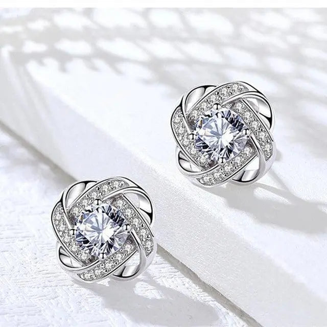 Boucles d'Oreilles Spirales Dorées avec Cristaux