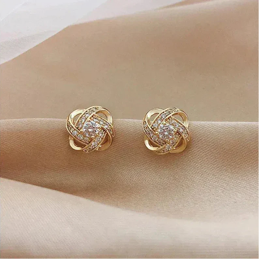 Boucles d'Oreilles Spirales Dorées avec Cristaux