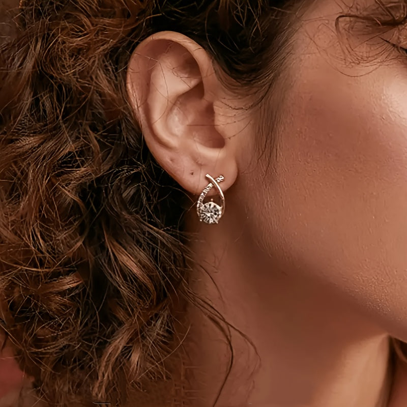 Boucles d'Oreilles avec Croix Dorée et Zircone