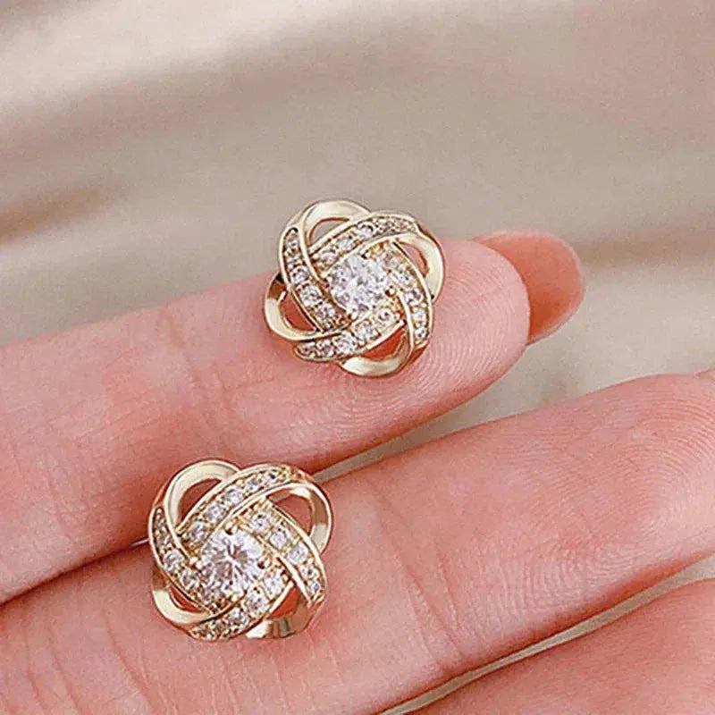 Boucles d'Oreilles Spirales Dorées avec Cristaux