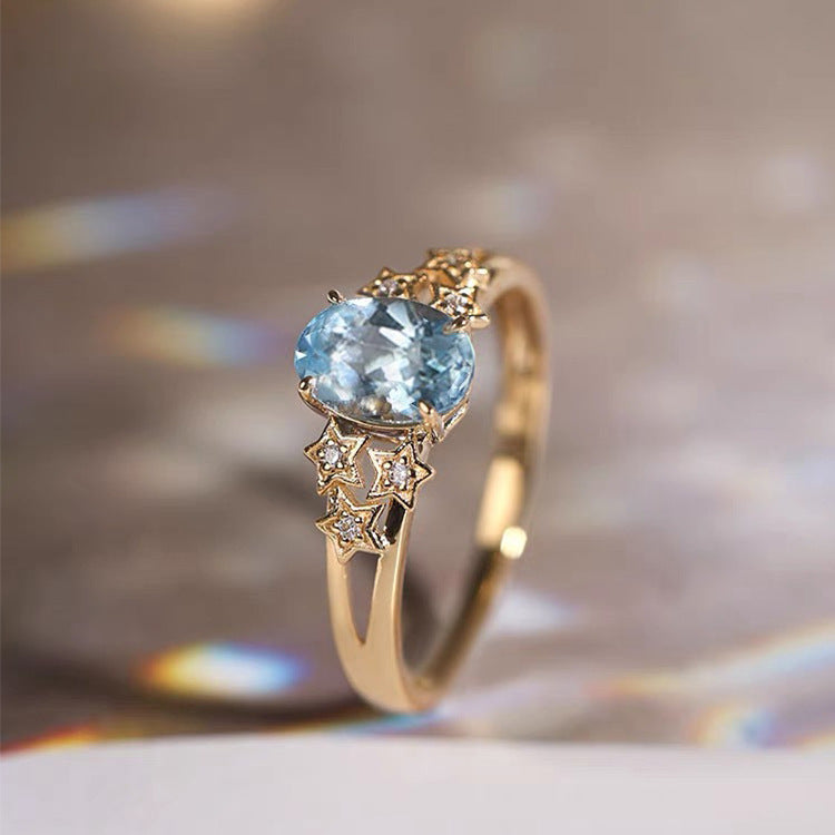 Bague Dorée Exclusive avec Cristal Bleu