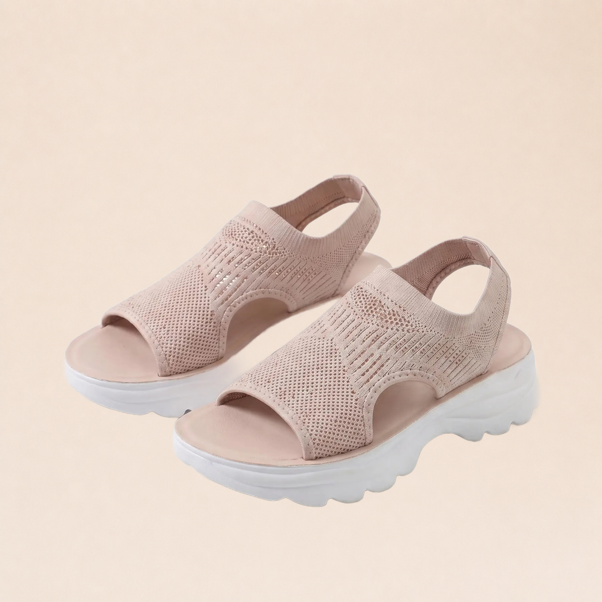 Sandales orthopédiques roses sur fond beige