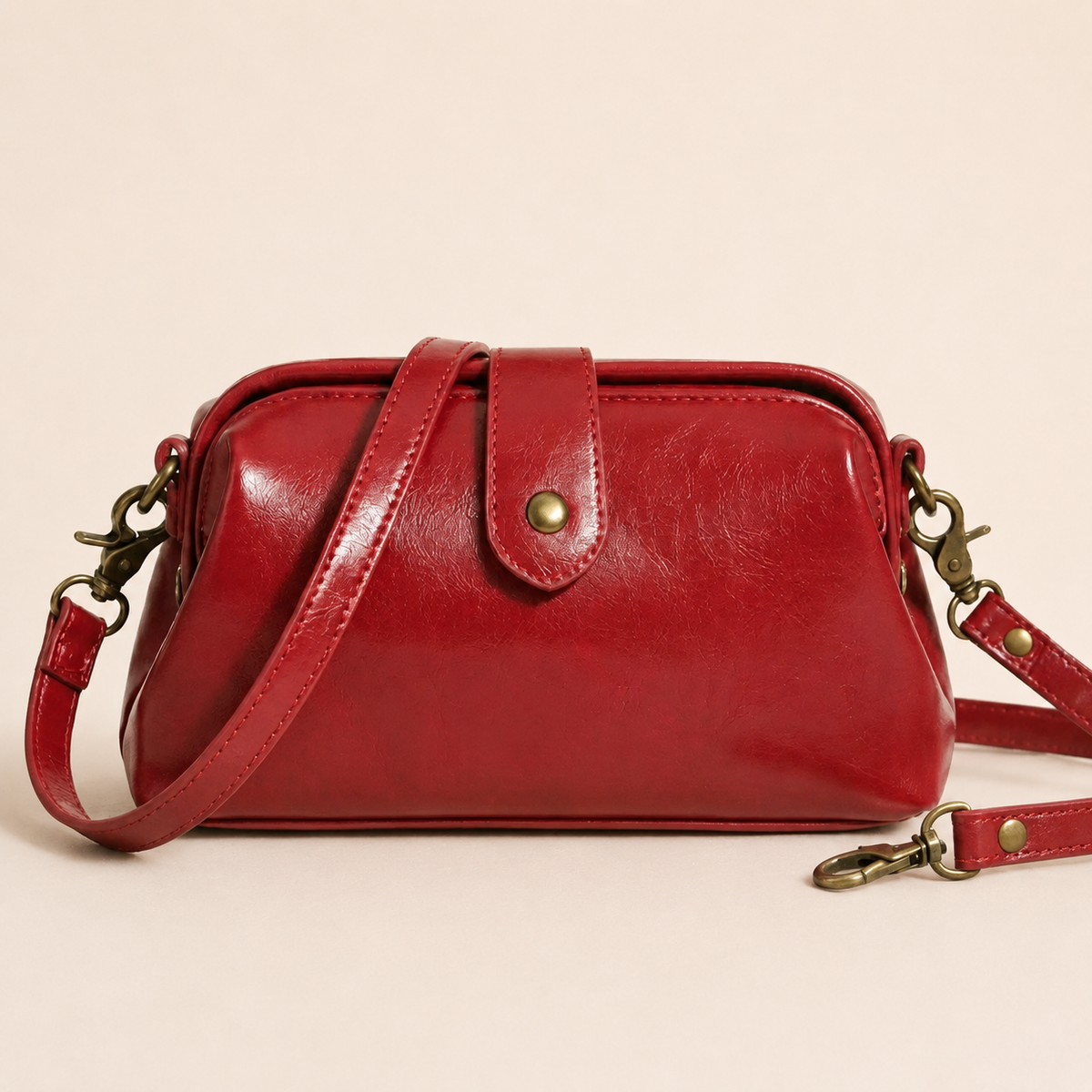 Aria | Sac à Bandoulière Vintage rouge sur fond crème Verlanden