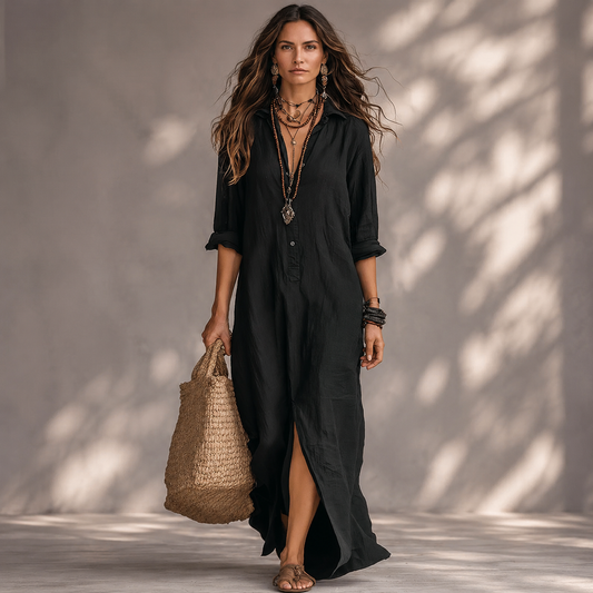 Soline | Robe maxi noire vue de face sur fond gris clair